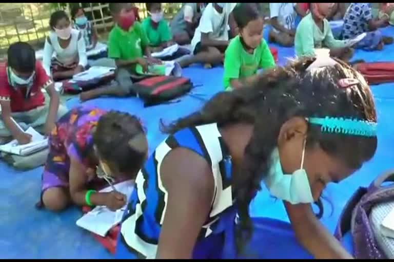 three woman teaches the students of tea garden area in khumtai