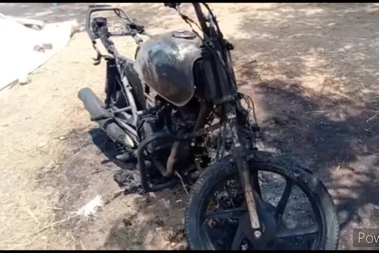 Thugs set fire to two wheelers at lokeshwaram