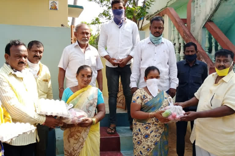 eggs and grossaries distributes by tdp leaders in visakkha