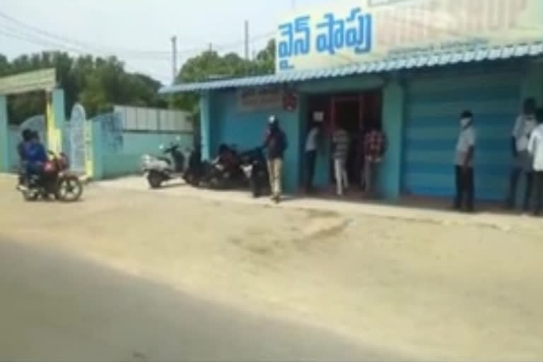 people waiting very much for liqour at wine shops in krishna district