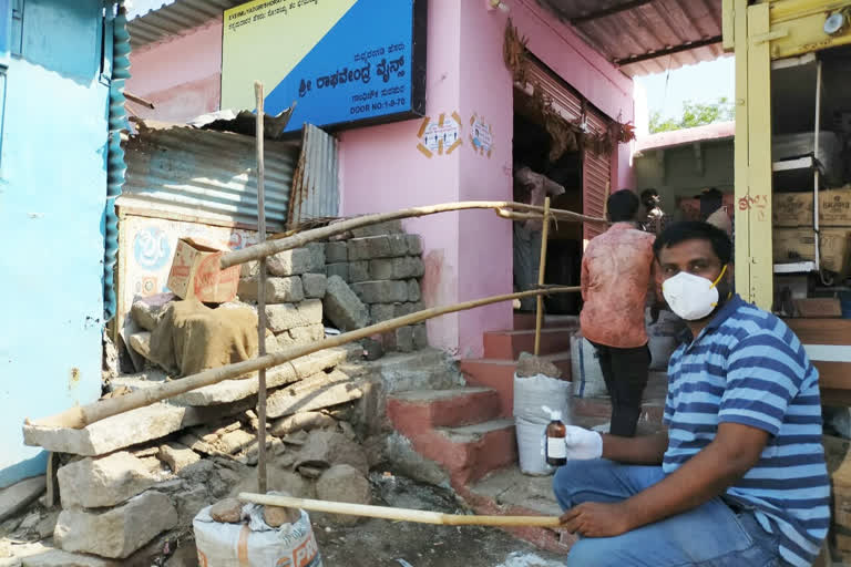 people gathered for alcohol in front of the bar at surapura