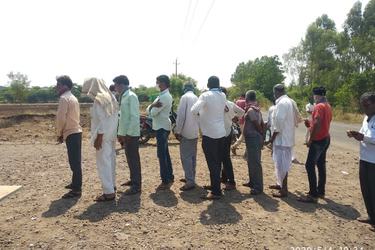 people gathered in front of Bar at Athani