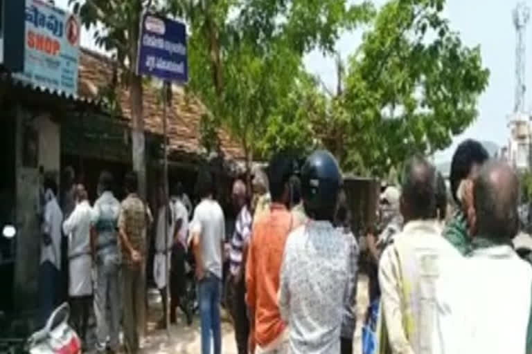 wine shops opened in yelamanchili and people not obeyed physical disance