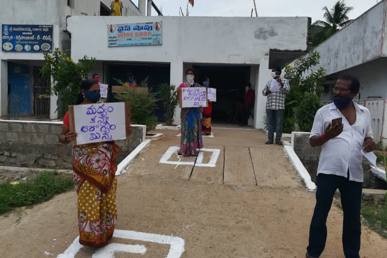 protest against to opening wine shops in vizag district