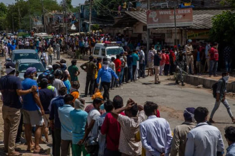 Long queues outside liquor shops in Noida