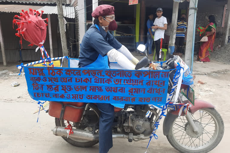 corona awareness campaign by a teacher in raiganj , north dinajpur