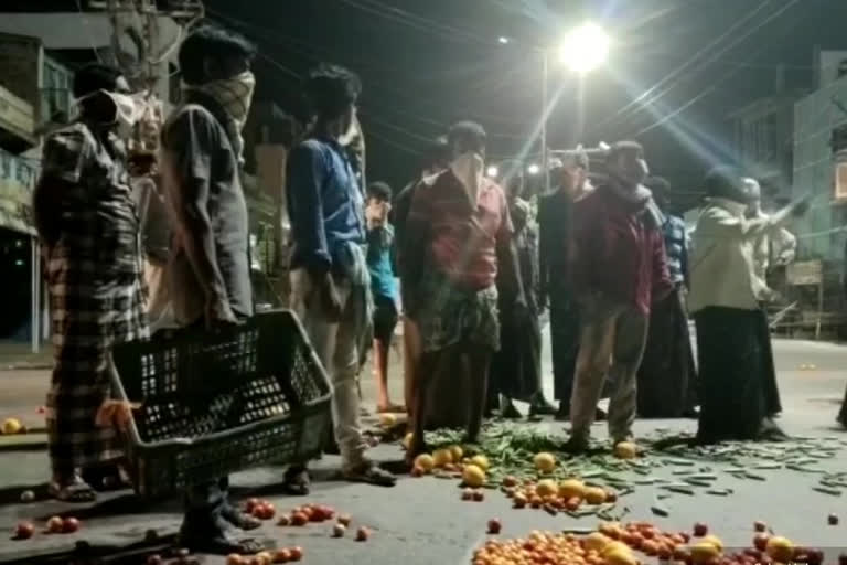 Farmers Protest throwing vegetables on the road