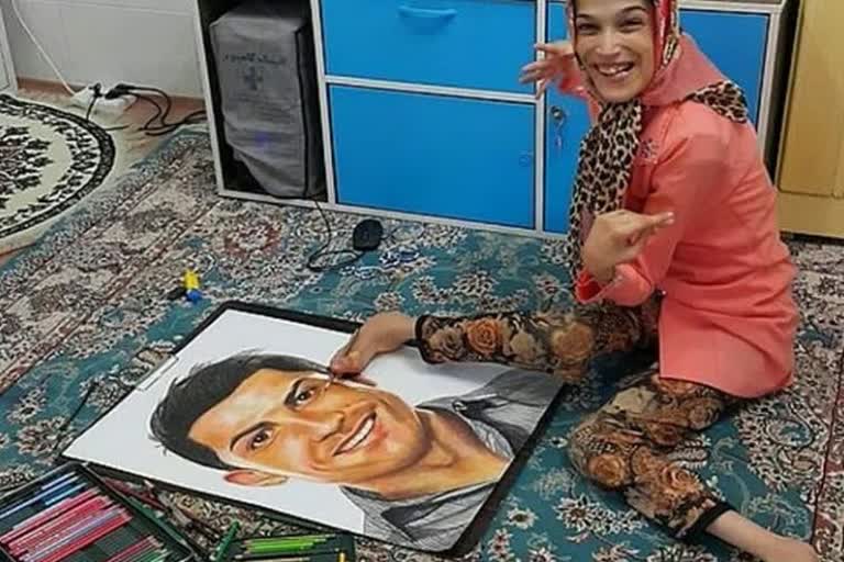 Iranian artist paints portrait of Ronaldo with feet