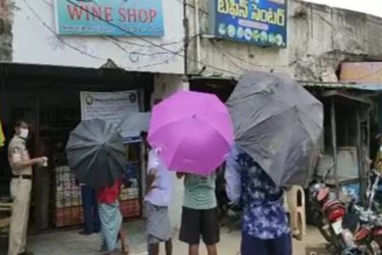 umbrella and mask compulsory for wine purchase