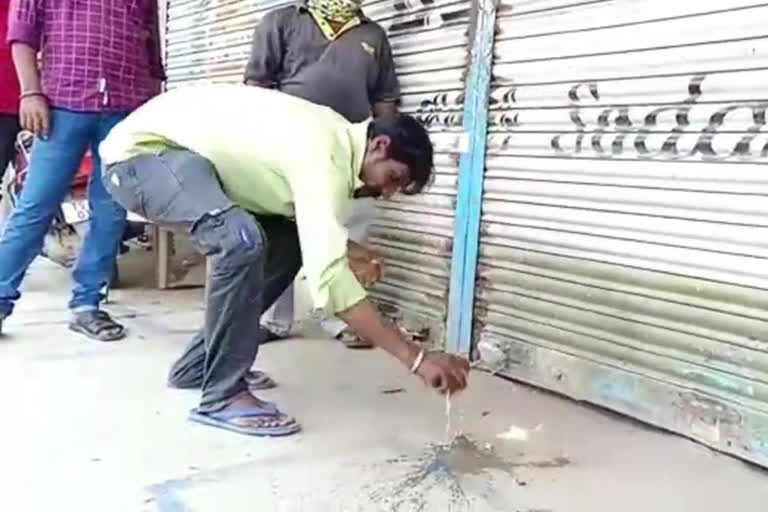 man gave the harati to wine shop in telangana