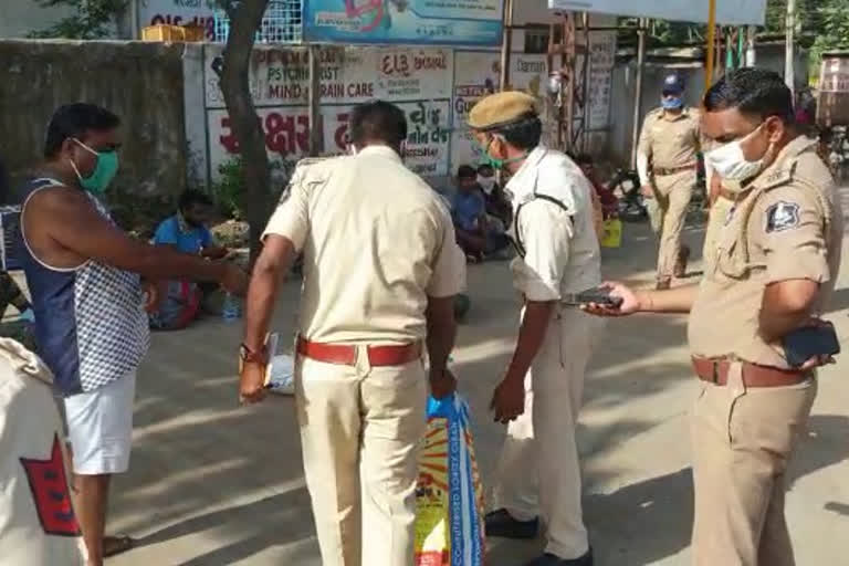 police help up workers in navsari district