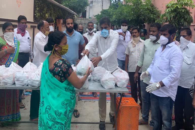 vegetables and sanitizers distributed in yellamma banda kukatpally