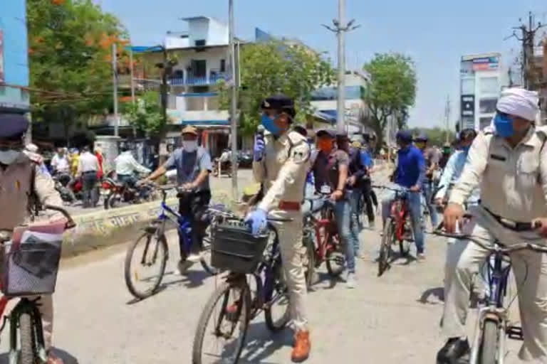 Police patrolling by bicycle during lock down