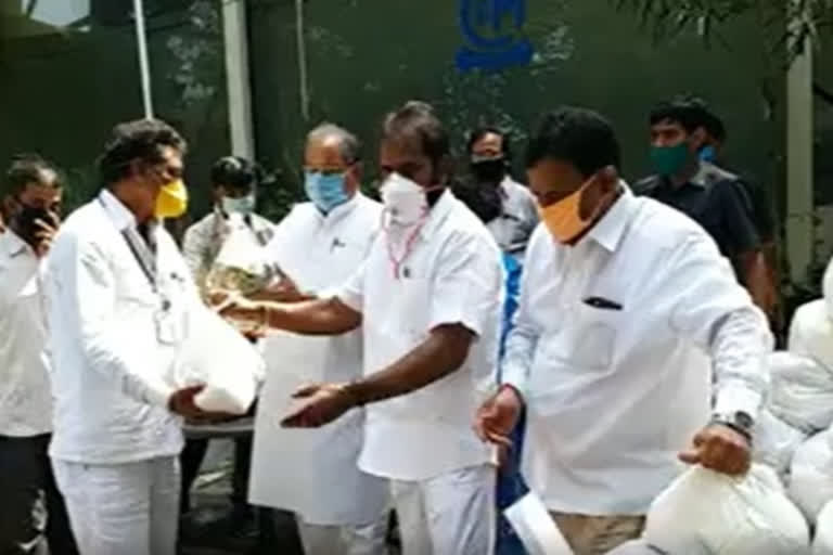 minister srinivas goud distributed groceries to needy in Hyderabad