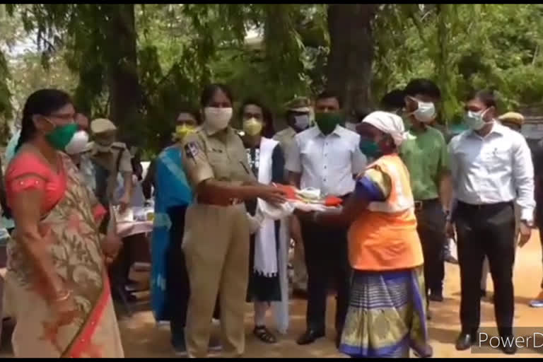 Distribution of masks and aprons to sanitation workers