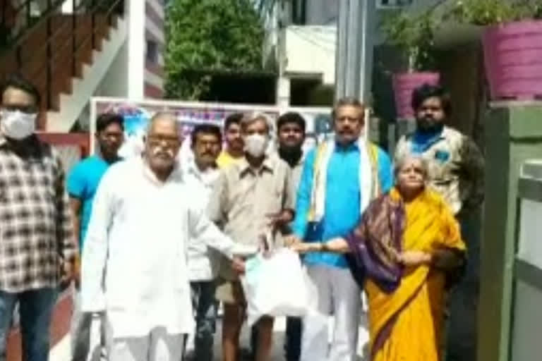 nri gives donation to give essentials to poor people in narasapuram