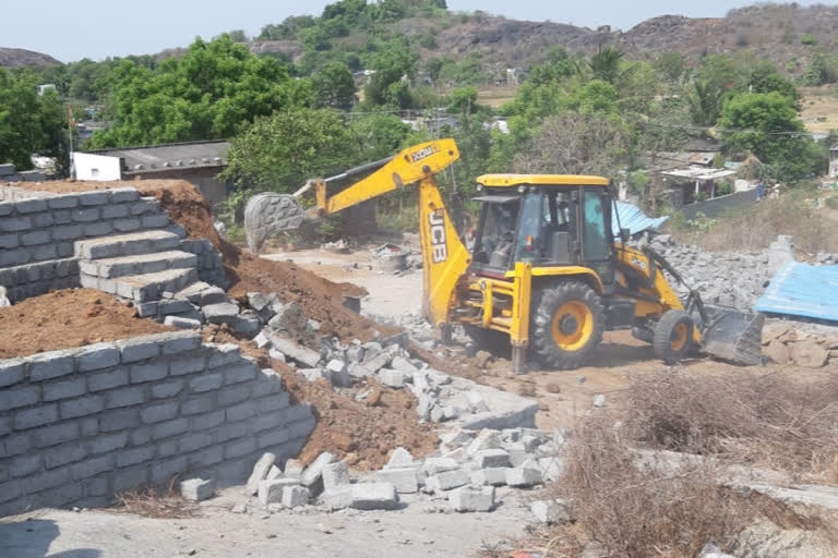 revenue officers took action on illegal construction in government land