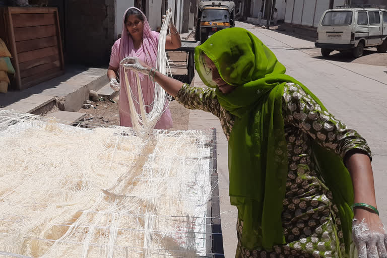 muslim women making sewai