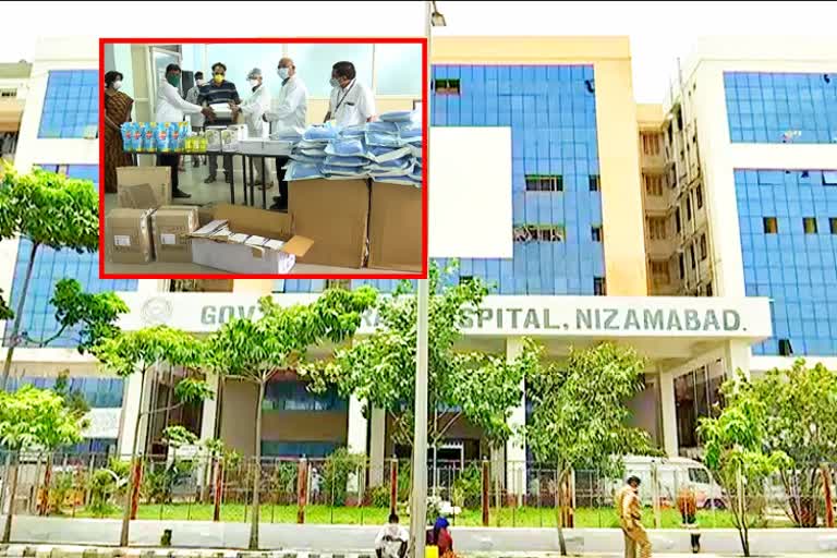 seva bharathi organisation donates ppe kits masks sanitizers to nizamabad hospital