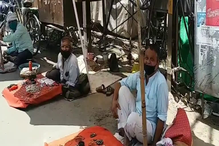 Waiting for customers in the scorching sun