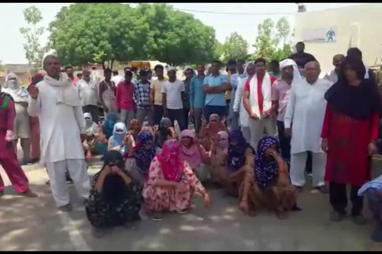 protest against wine shop in sundana village rohtak