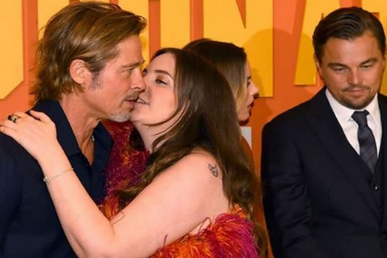 Lena Dunham addresses that 'awkward' kissing photo with Brad Pitt
