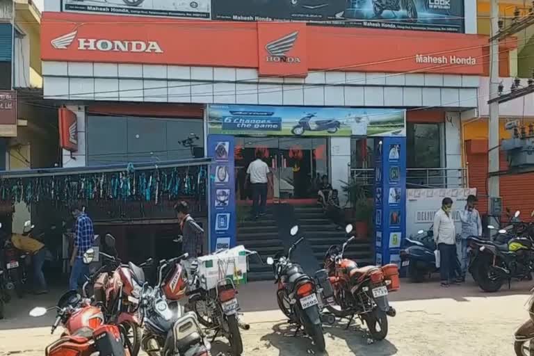 after a long time , bike and car showroom was opened