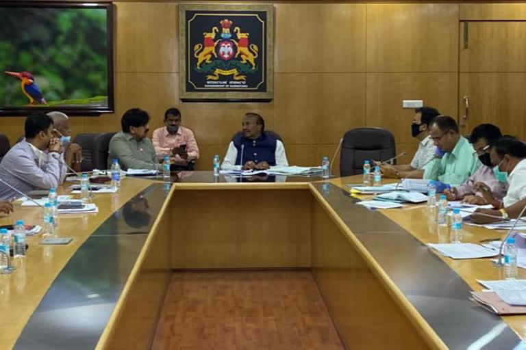 Meeting with Minister Eshwarappa officials on the implementation of programs announced in the budget