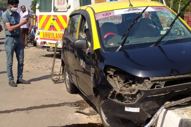 Car climbed on road divider