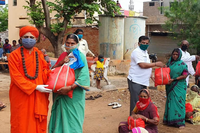 Distribution of Food Grains Kit by Bhovi Math Swami