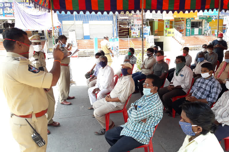 A police meeting with the owners of barber shops