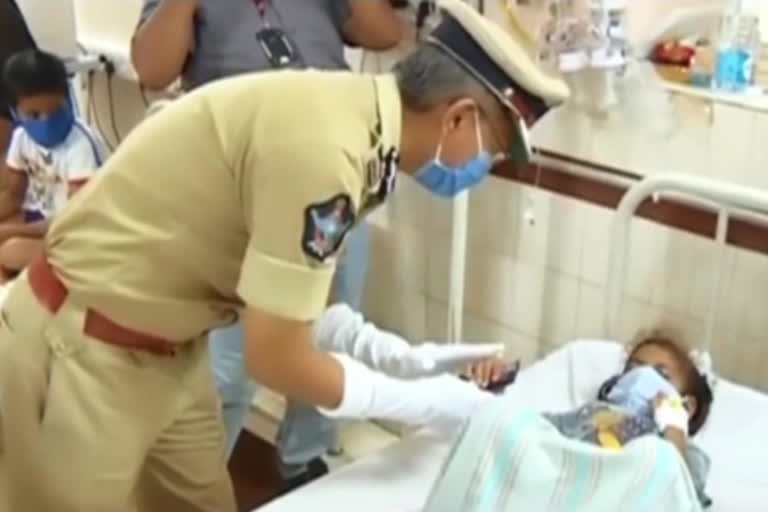 dgp goutham sawang meet vishaka gas leak affected children