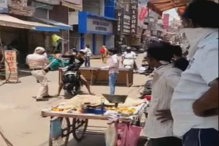 viral video of youth beaten by policeman in faridabad