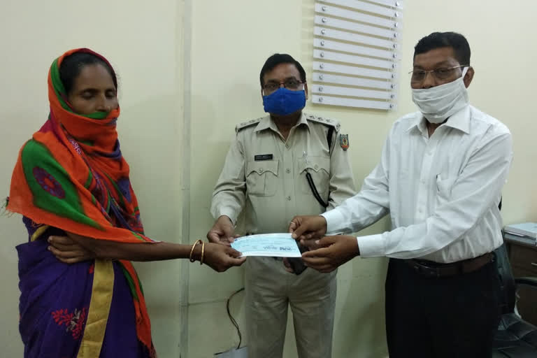 Police administration handed over check