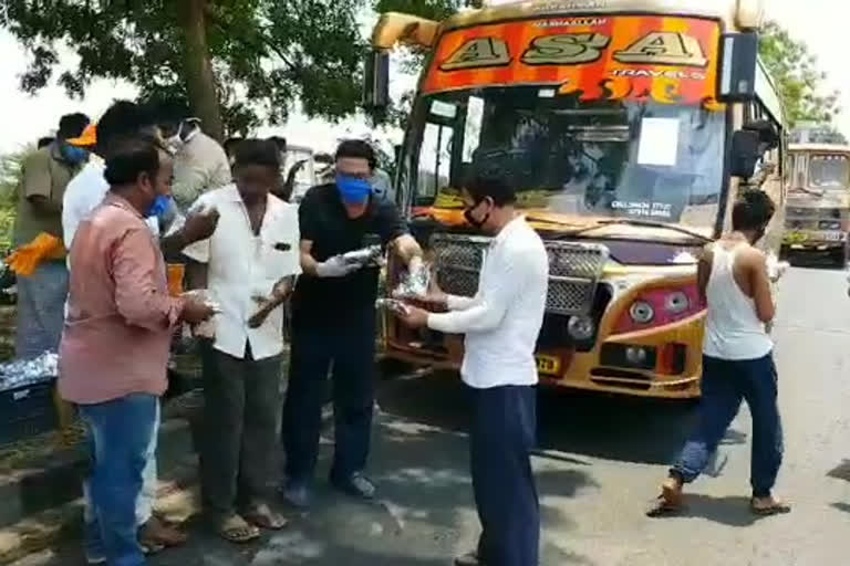 Distribution of food packages to migrants at westgodavari district