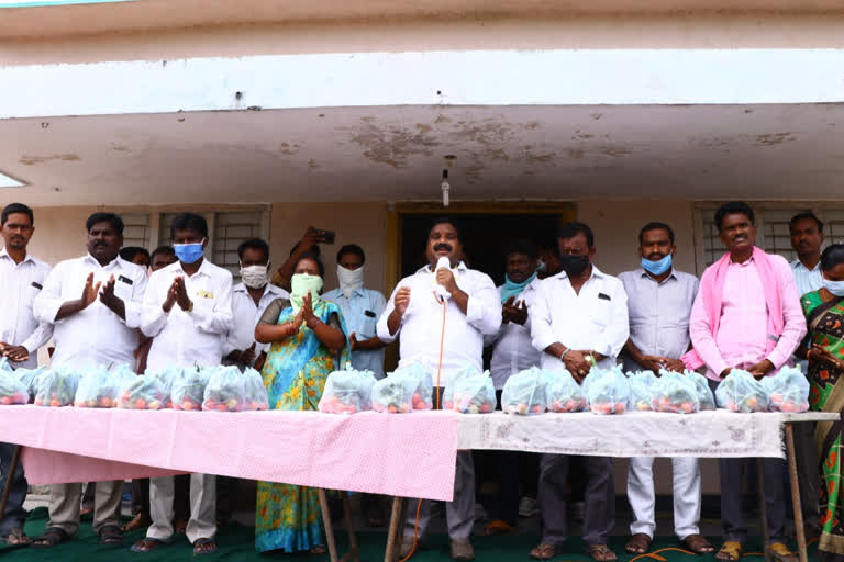 Distribution of essential commodities to poor families in Warangal