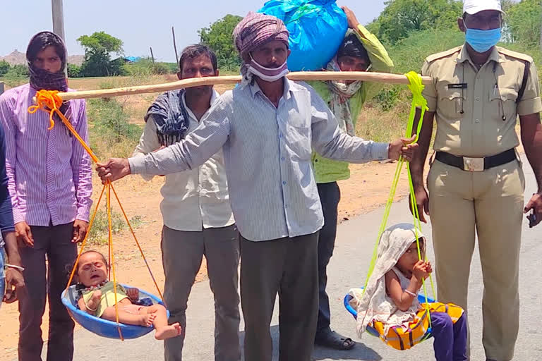 cops come to rescue migrant on long march with kids