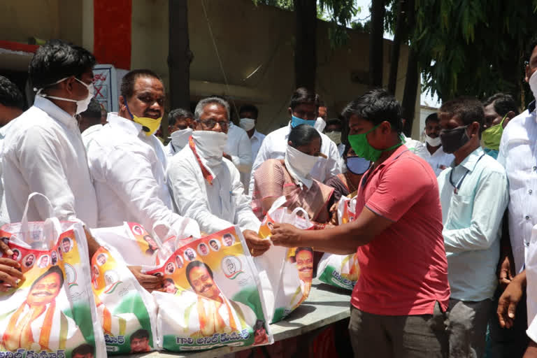 congress leader groceries distribution in sangareddy district