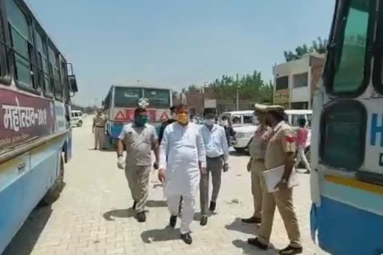 cabinet minister kanwarpal gurjar meets migrant laborers in yamunanagar