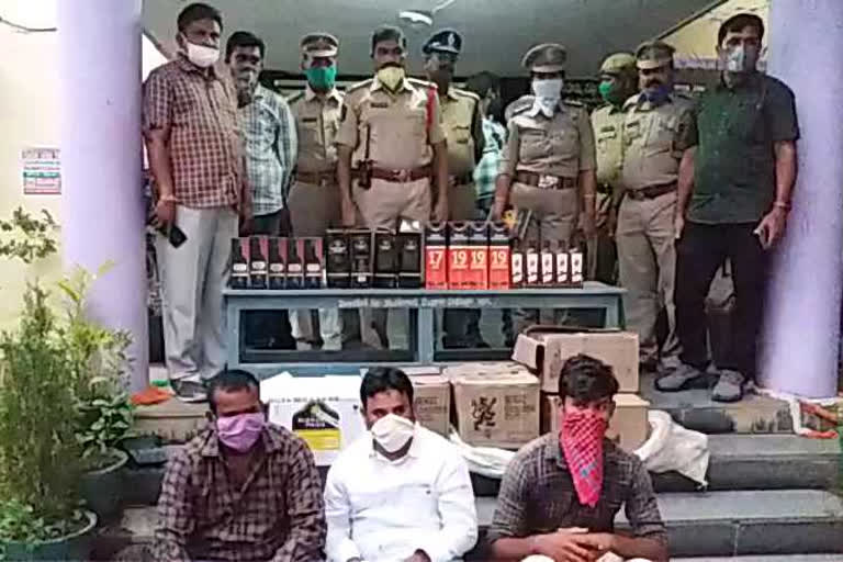 illegal liquor caught by nandyal police and three people arrested