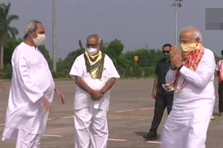 PM Modi arrives in Odisha; Guv, CM receives him by maintaining social distancing