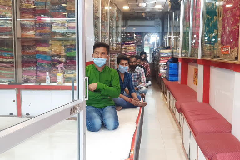 no customers in clothes shop at Raiganj