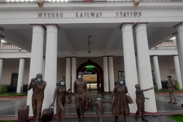 Sculptures outside Mysuru railway station now sports face masks