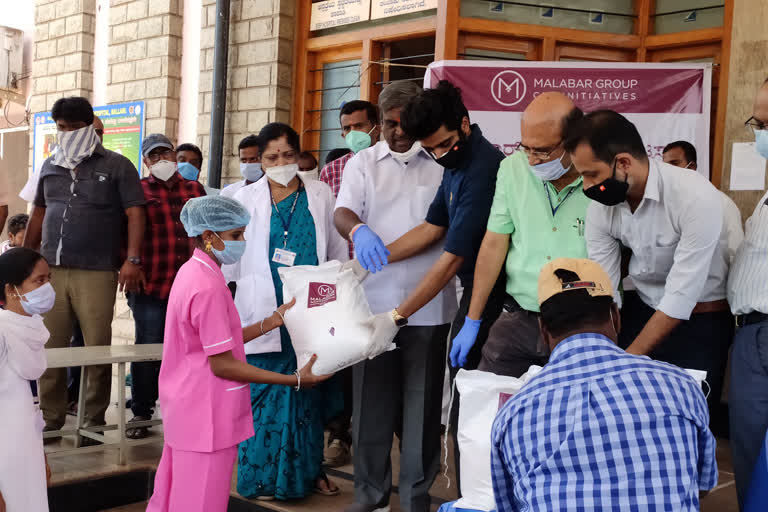 Somashekhar Reddy,  distributed ration kits