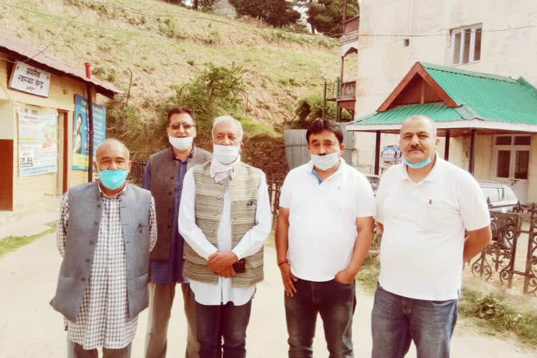 Rakesh Singha with gardeners