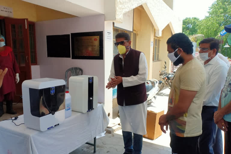 mla nurpur donated sanitizer machine