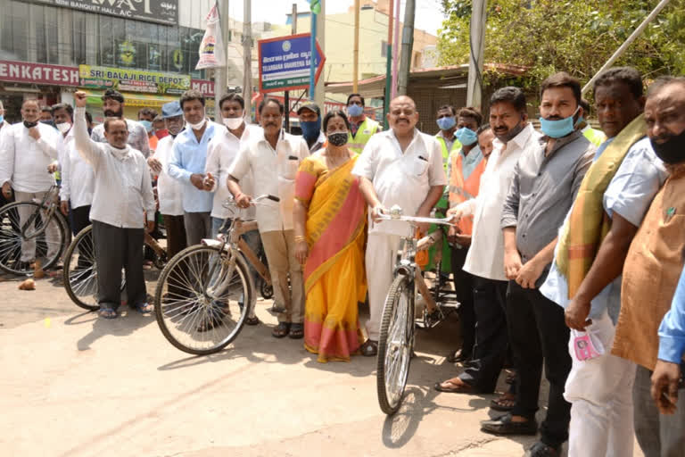 mla muta gopal distributed rikshaws