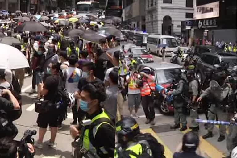 Protesters mass in Hong Kong as anthem law is debated