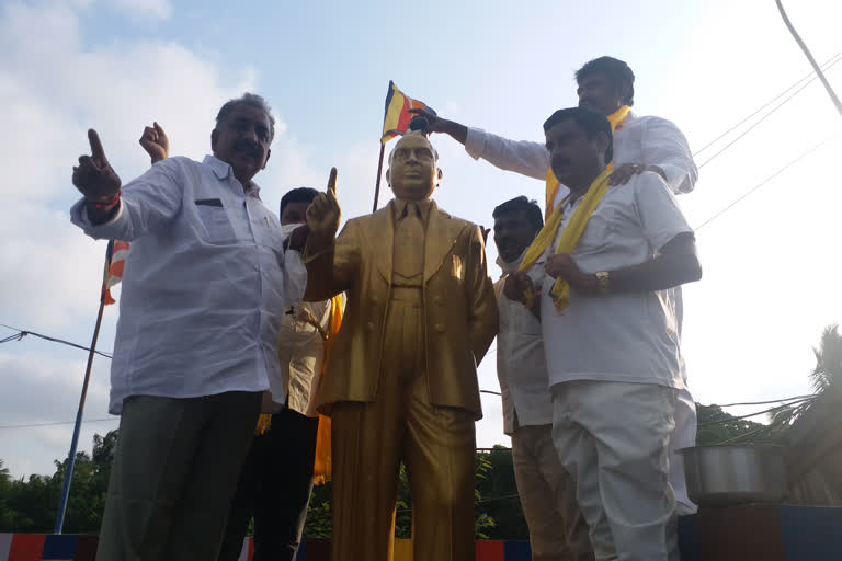 tdp leaders honoured with milk to ambedkar  in p gananvaram