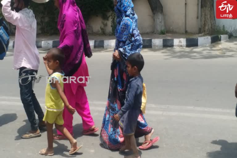 heart wrenching video of small kid walking bare foot to back home